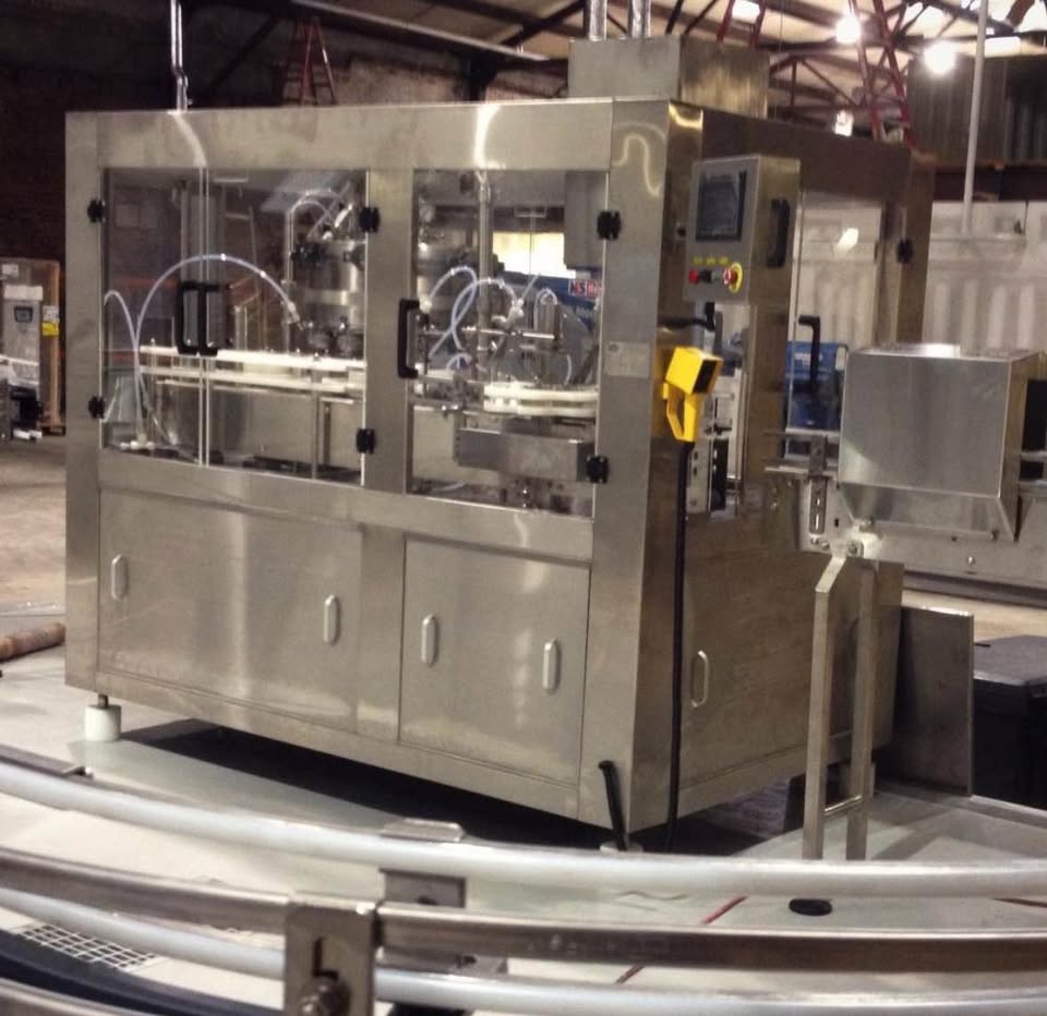 (Reduced!) Palmer 12-Head Rotary Isobaric Canning Line – 35 CPM